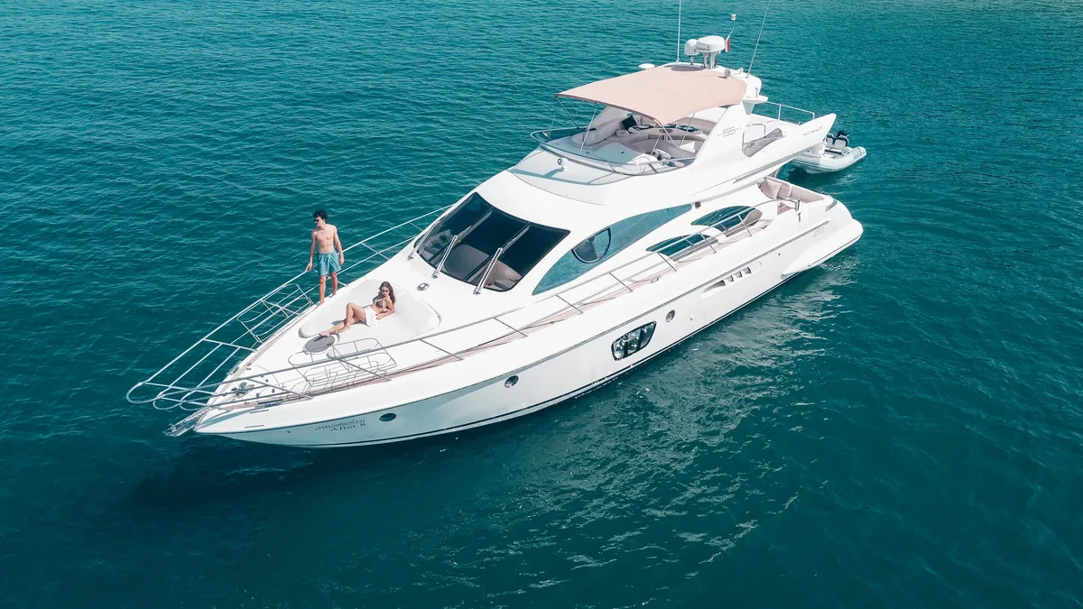 Azimut 55 After 8 — aerial bow-on view with guests on the foredeck