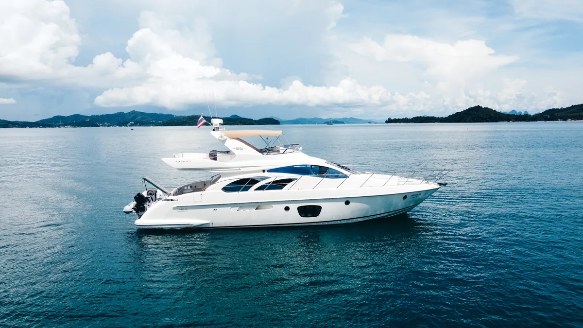 Azimut 55 After 8 — at anchor with Andaman islands behind