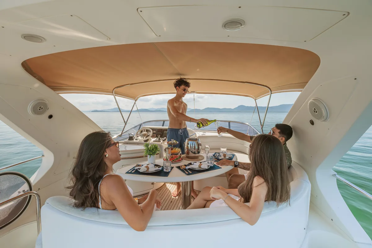 Azimut 55 After 8 — flybridge dining table set for guests