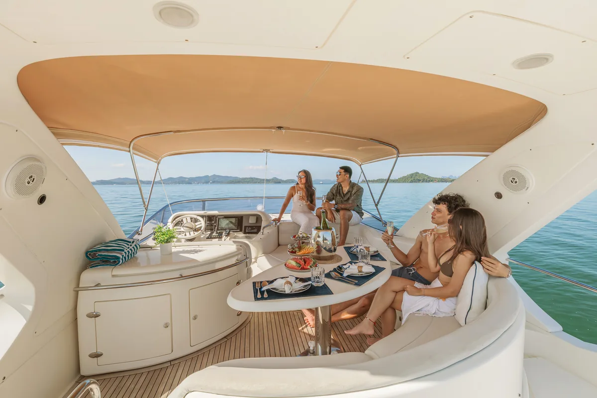 Azimut 55 After 8 — flybridge lounge and sunbed area