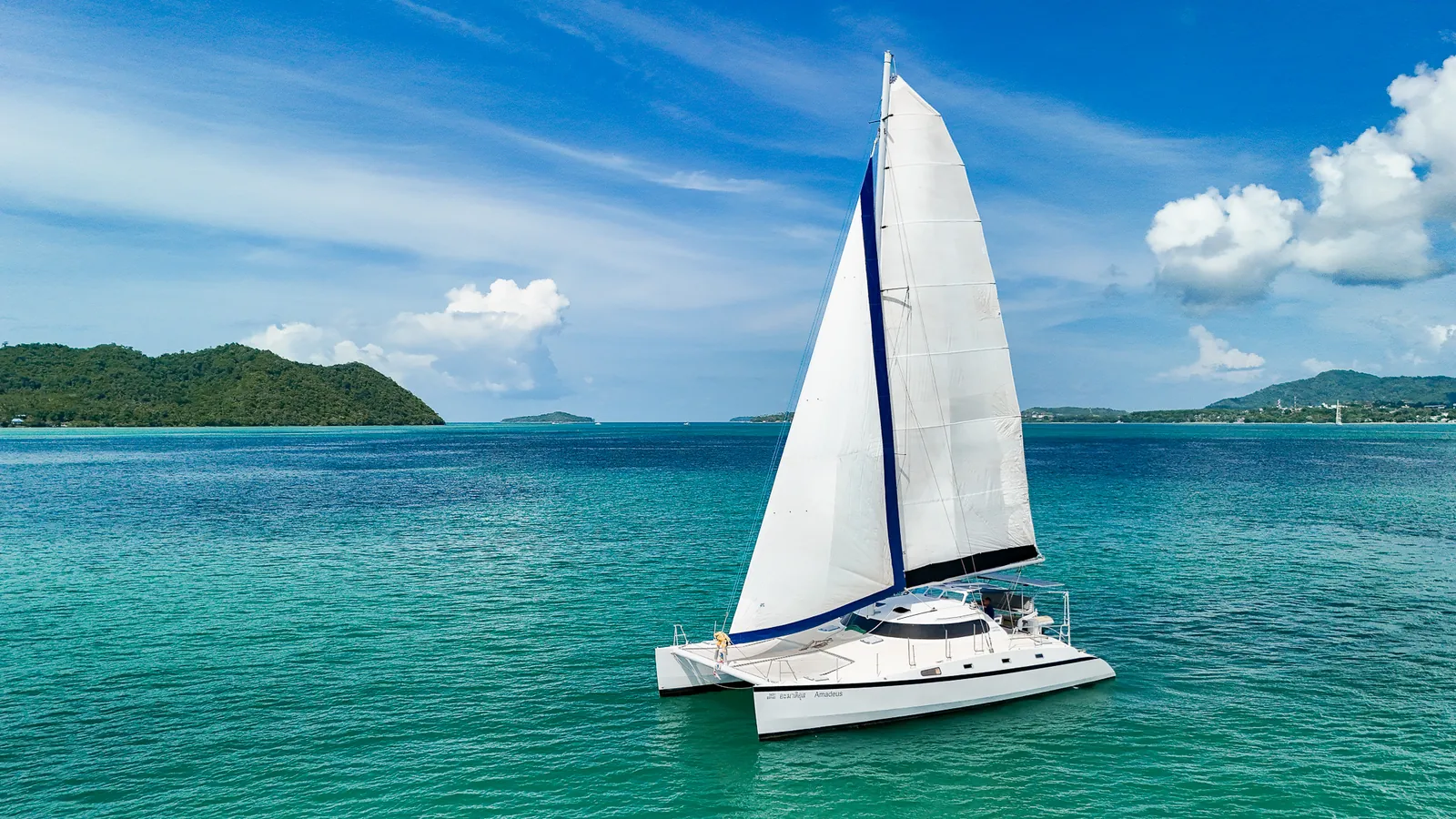 Sailing catamaran Amadeus under sail off Phuket on the Best of Andaman cabin charter