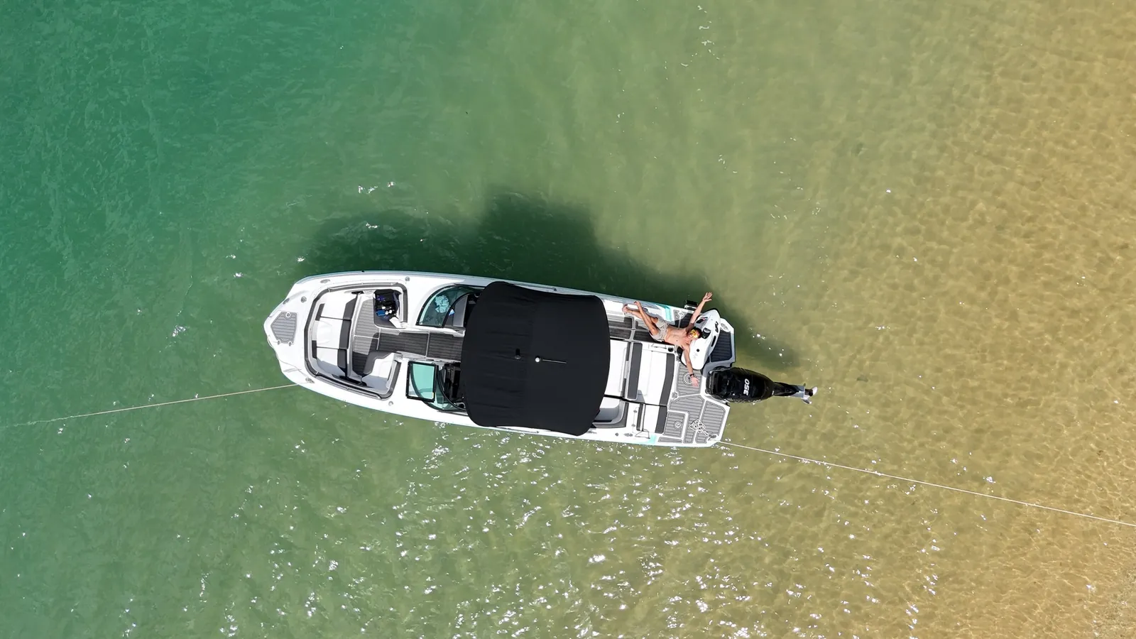 Monterey M65 — at anchor over a sandbar