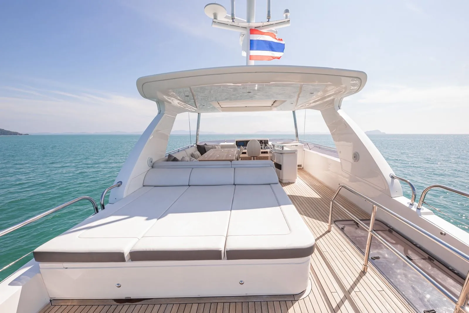 Princess 78 W.J. Lip — flybridge sunpads and hardtop