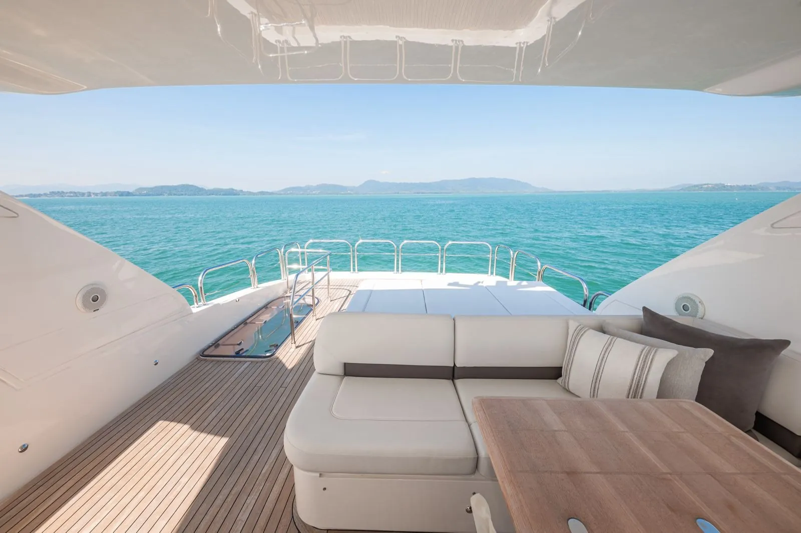 Princess 78 W.J. Lip — flybridge lounge and dining table