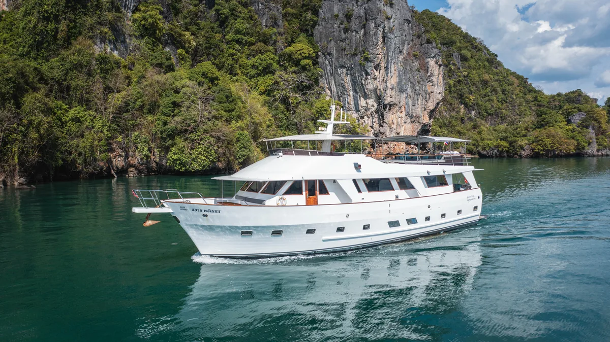 Siam Princess 70 — cruising past limestone cliffs in Phang Nga Bay